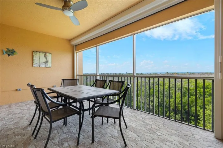 Large screened in porch that boasts gorgeous sunset views, distant boats, birds and wildlife