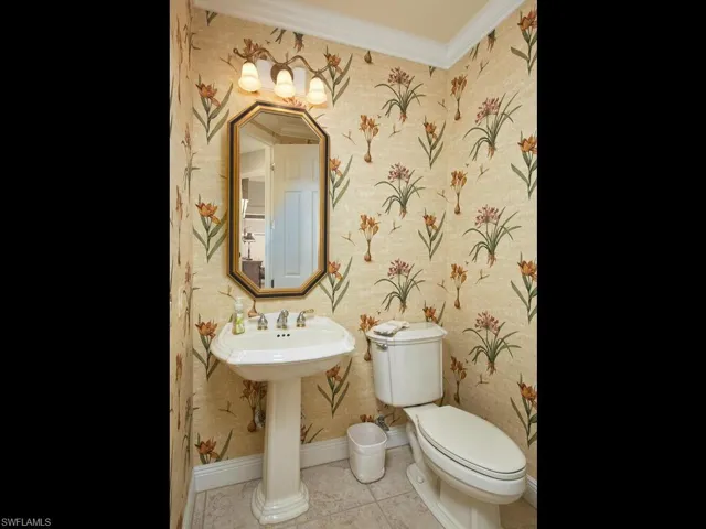 Half-bath conveniently located at sliders to lanai...perfect pool bath for the grandkids!