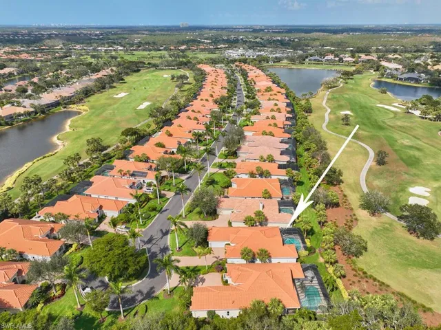 The 53 houses known as Ginger Pointe...to the left (south) is fairway #4, at top (west, next to lake) is par 3 #5 and #6 fairway to right par 4. Ginger Pointe is located next to clubhouse and sports amenities...see white buildings at top of drone picture. Very convenient!!