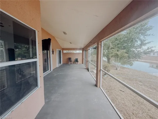 View of patio / terrace and water view