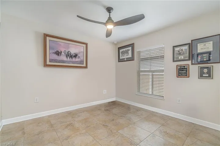 Spare room featuring ceiling fan