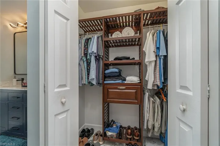 Walk in closet featuring sink