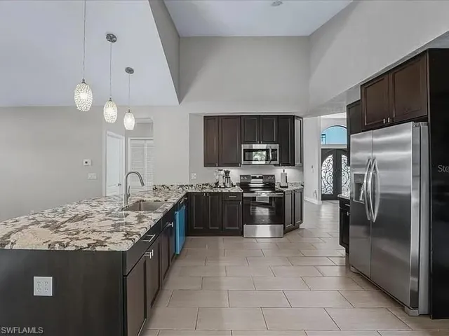 real wood cabinets with brand new appliances