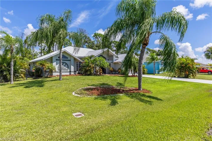 Ranch-style home with a front yard