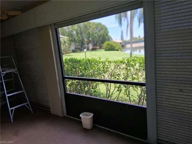 Laundry in lanai with awesome storage doors