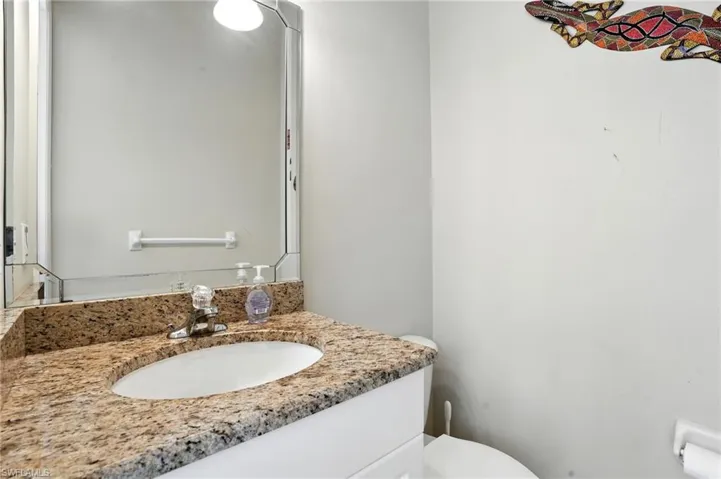 Bathroom with vanity and toilet