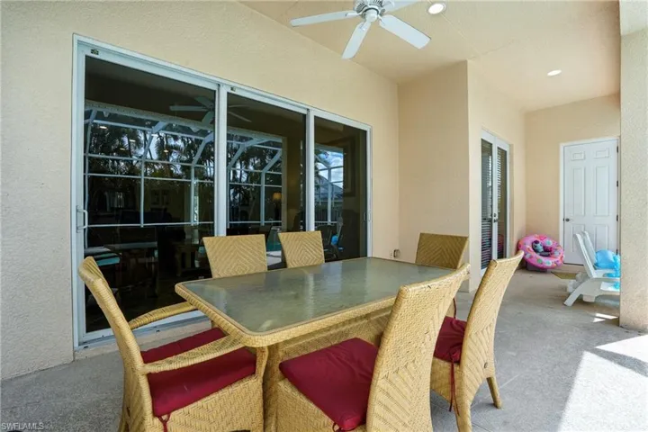 View of patio / terrace featuring a ceiling fan and outdoor dining area