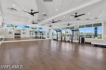 Workout area with wood-type flooring