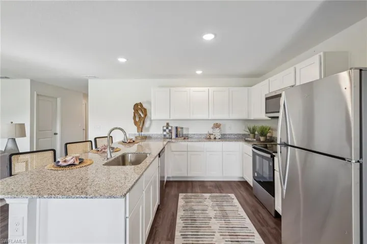 Photos are of a model home or artist rendering; any dimensions listed are approximate and may change. Home aspects and included items may vary and are not intended to form part of any contract or warranty. Home may be virtually staged.