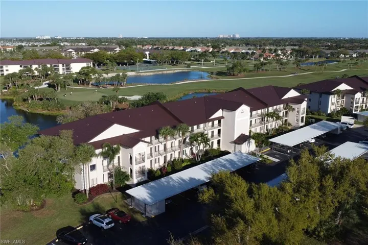 Bird's eye view of a local golf course and a nearby body of water