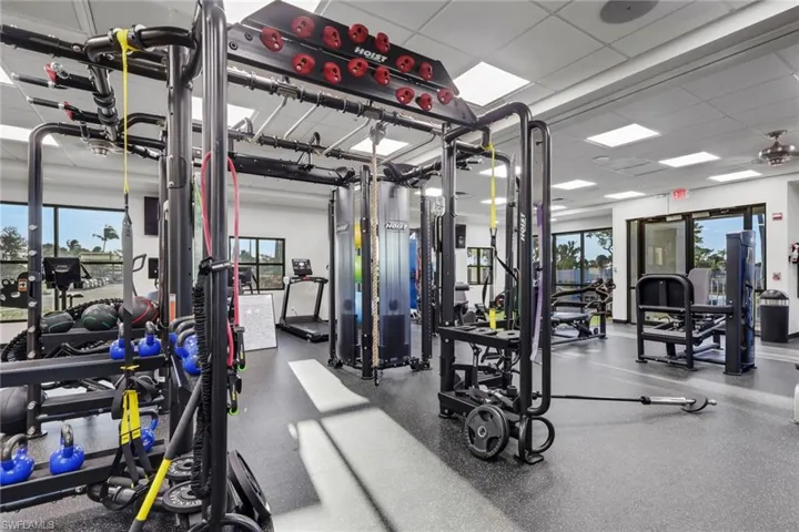 Workout area featuring a paneled ceiling