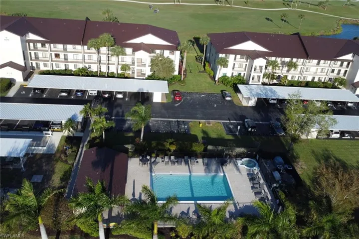 Drone / aerial view of a golf club and a large body of water