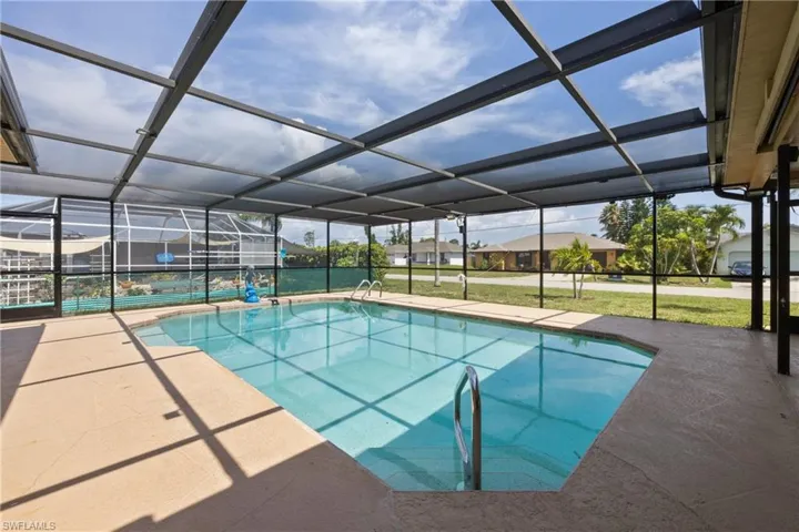View of pool, lanai