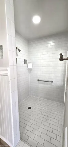 Full bathroom featuring a hugestall shower