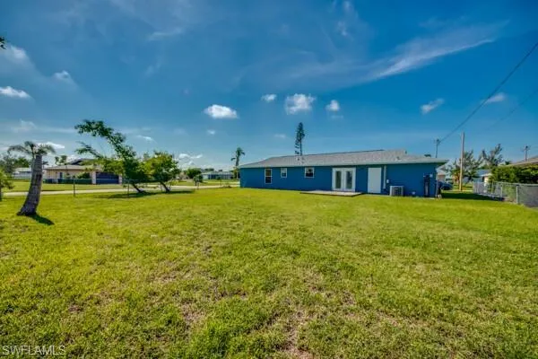 Rear view of property with a patio