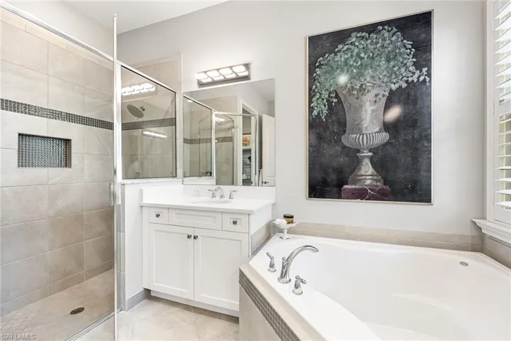 Large shower plus separate soaking tub.