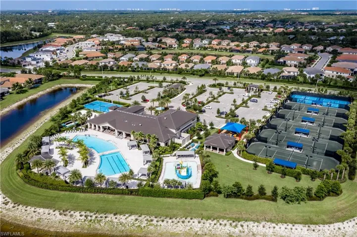 Community ameneties with 4 pickleball courts, 5 har tru lighted tennis courts, kids pool with slide, hot tub, resort pool, lab pool, billiards room