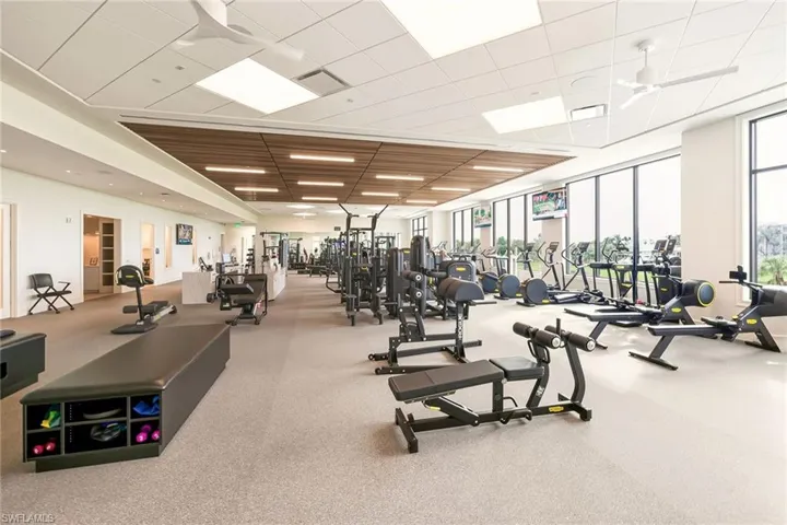 Workout area featuring a paneled ceiling