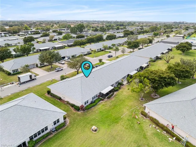 Birds eye view of property with a residential view