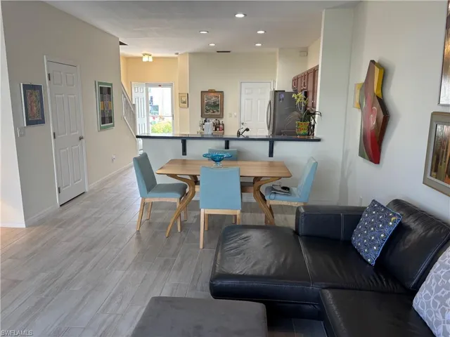 Dining area featuring recessed lighting and light wood-style floors