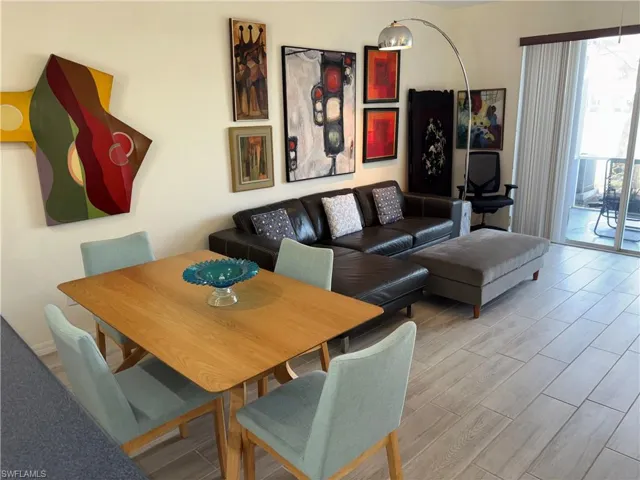 Dining room featuring wood tiled floors