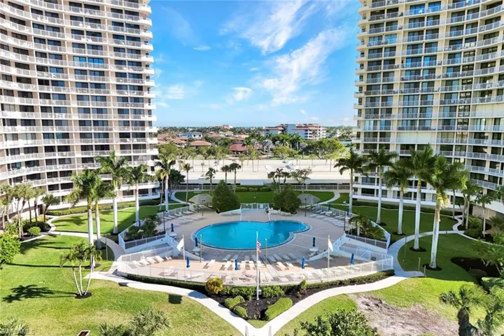 Community pool with a patio area