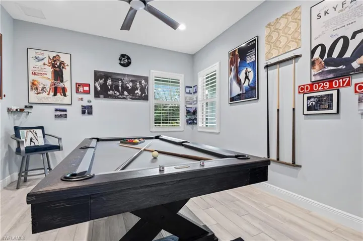 Game room featuring billiards and ceiling fan