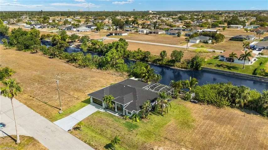 Bird's eye view with a residential view and a water view