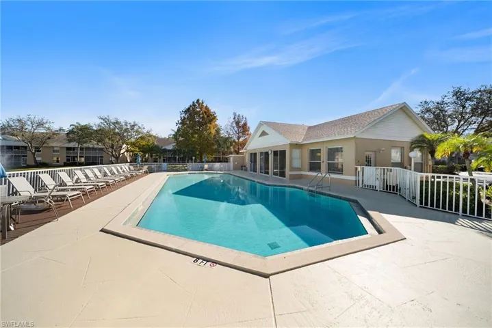 Community pool featuring a patio area