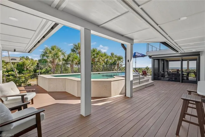 Wooden deck with outdoor dining area