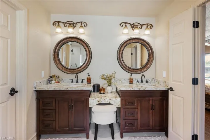 Ensuite bathroom featuring ensuite bathroom and vanity