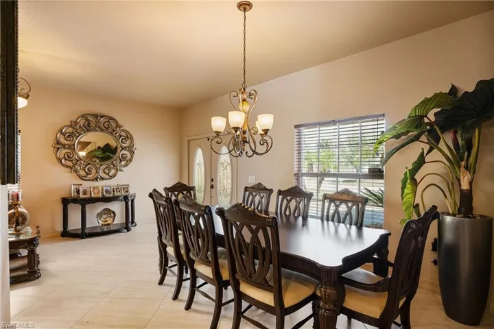Dining room with a notable chandelier