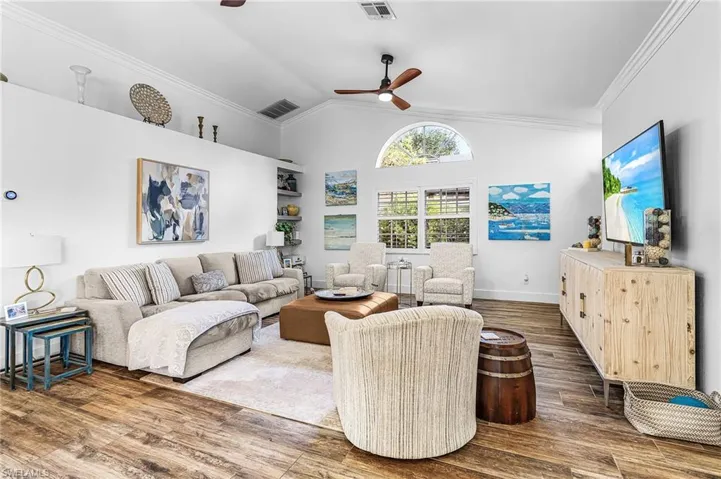 Living area with high vaulted ceiling