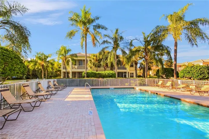 Community pool featuring a patio area