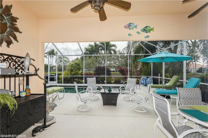 PERFECT SCREENED PATIO WITH POOL AND COVERED AREA
