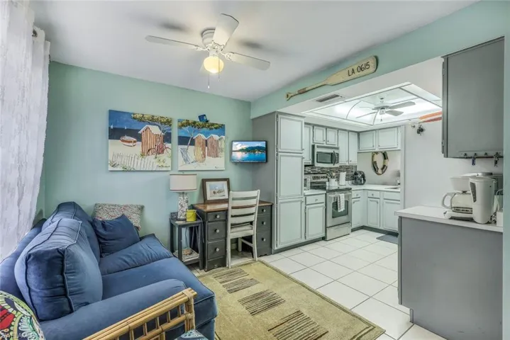Tiled living room with ceiling fan