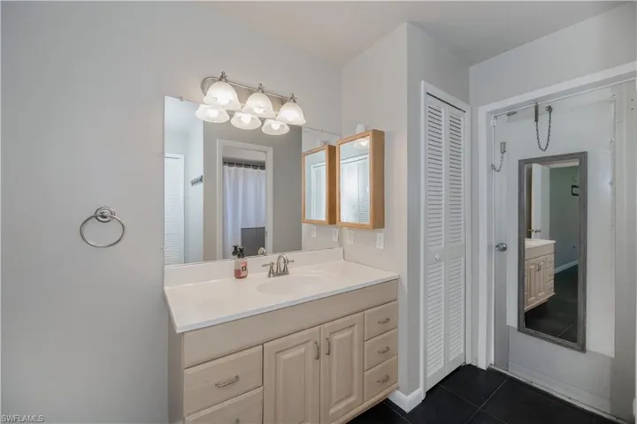 Master bath with large linen closet