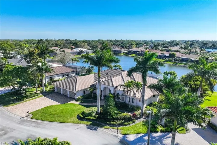Aerial view of residential area with a nearby body of water