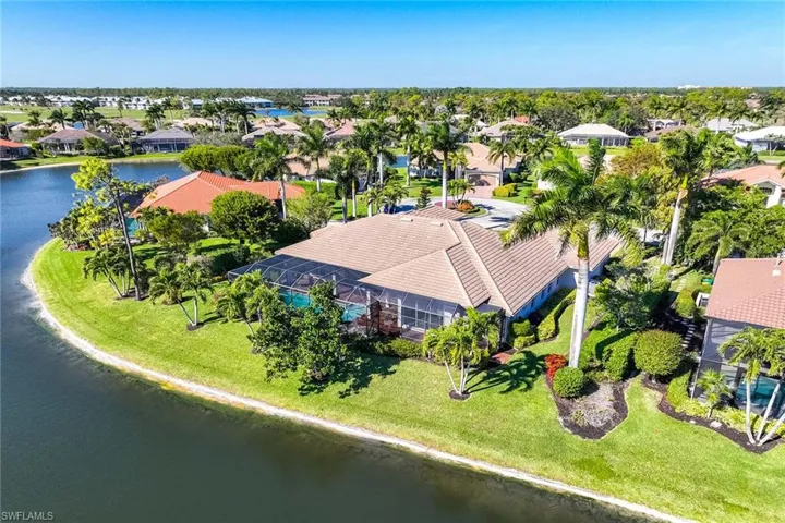 Aerial view of residential area with a large body of water