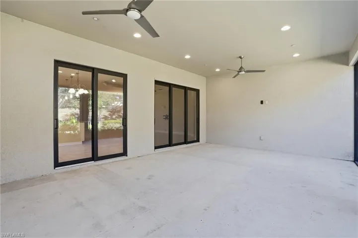 View of patio featuring a ceiling fan