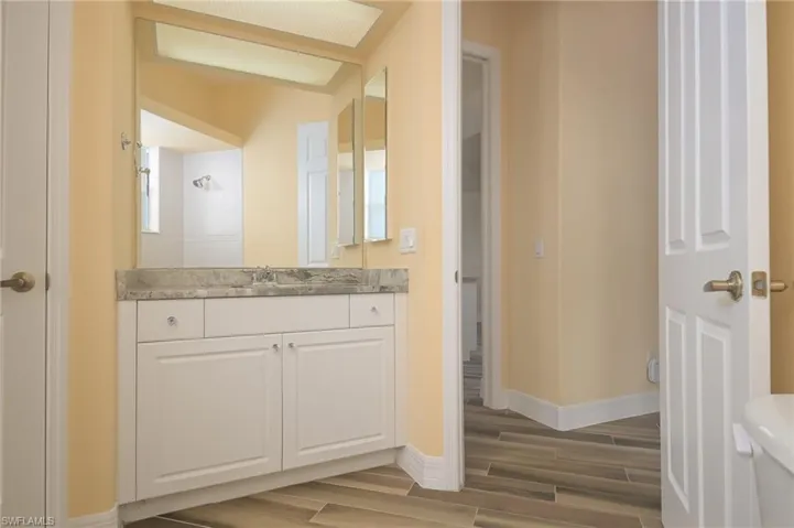 Bathroom featuring toilet and vanity