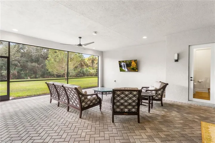 Lanai featuring ceiling fan, a patio area, and outdoor lounge area