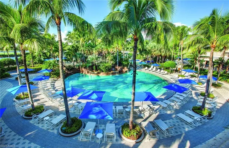 View of community with a patio area and a pool