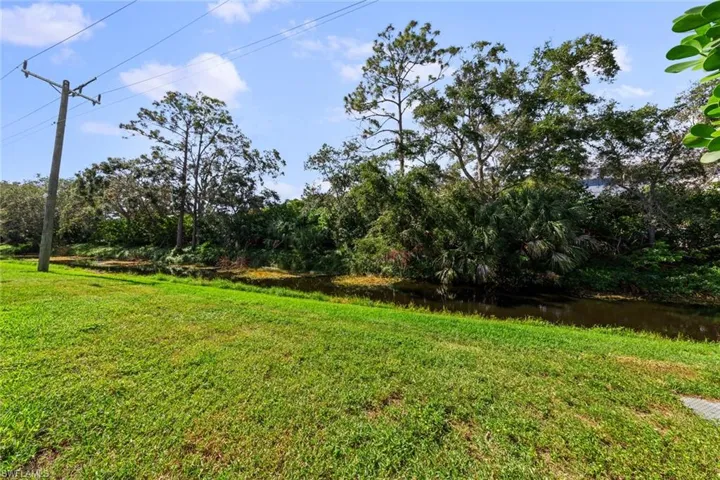 View of yard featuring a water view