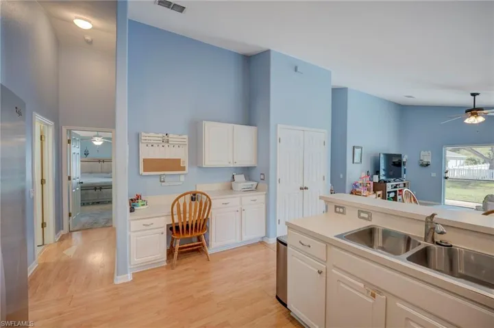 Built in desk in the kitchen and large pantry too!