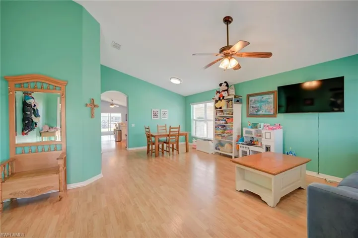 Step in to a bright and open formal living and dining room.