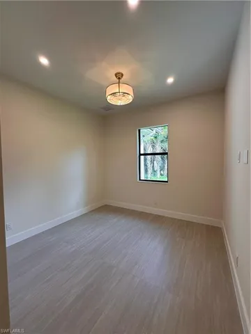 Spare room with recessed lighting and light wood-style floors