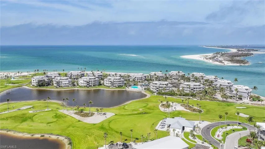Bird's eye view of a nearby body of water and a golf club