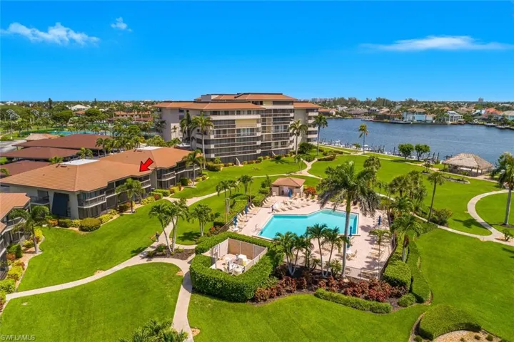 Aerial view of a large body of water and a pool