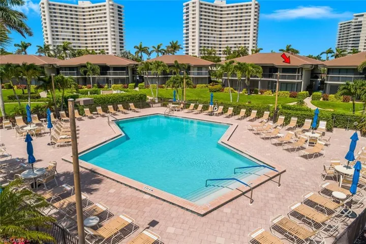 Community pool featuring a patio